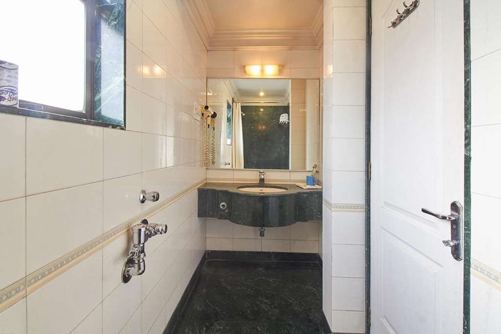 Hotel Srimaan Pune Quarto foto